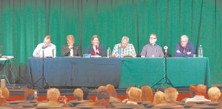 Incline’s GID in Its ‘Rebuilding Era’ NEW BLOOD: Only one incumbent, Michaela Tonking (pictured with microphone), is running for reelection on the Incline Village General Improvement District trustee board. She’s squaring off against Harry Swenson, Michelle Jezycki, Mick Homan, Mark Case, and Frank Wright (pictured left to right). Photo by Jared Alden/Moonshine Ink